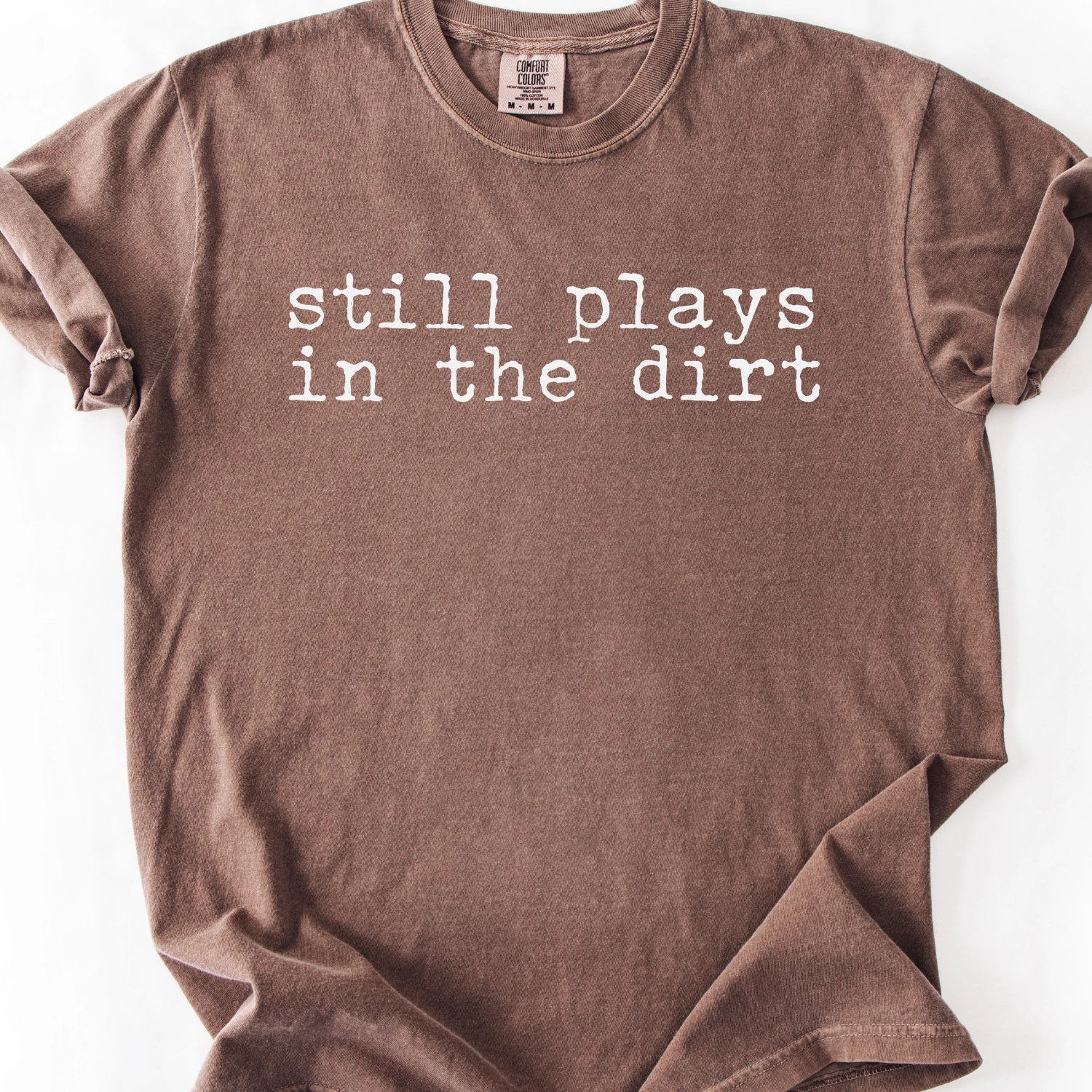 Still Plays In The Dirt T-Shirt
